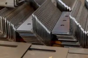 bent sheet metal parts stacked up